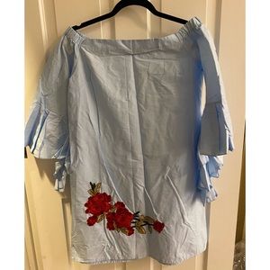 Blue off the shoulder dress with floral detail